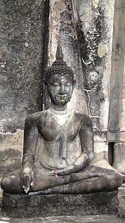 A sitting Buddha Image in front the tall standing Buddha Image, Wat Saphan Hin, Sukhothai
